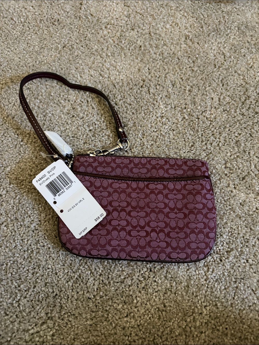 Coach Small Signature Wristlet in Burgundy Pink